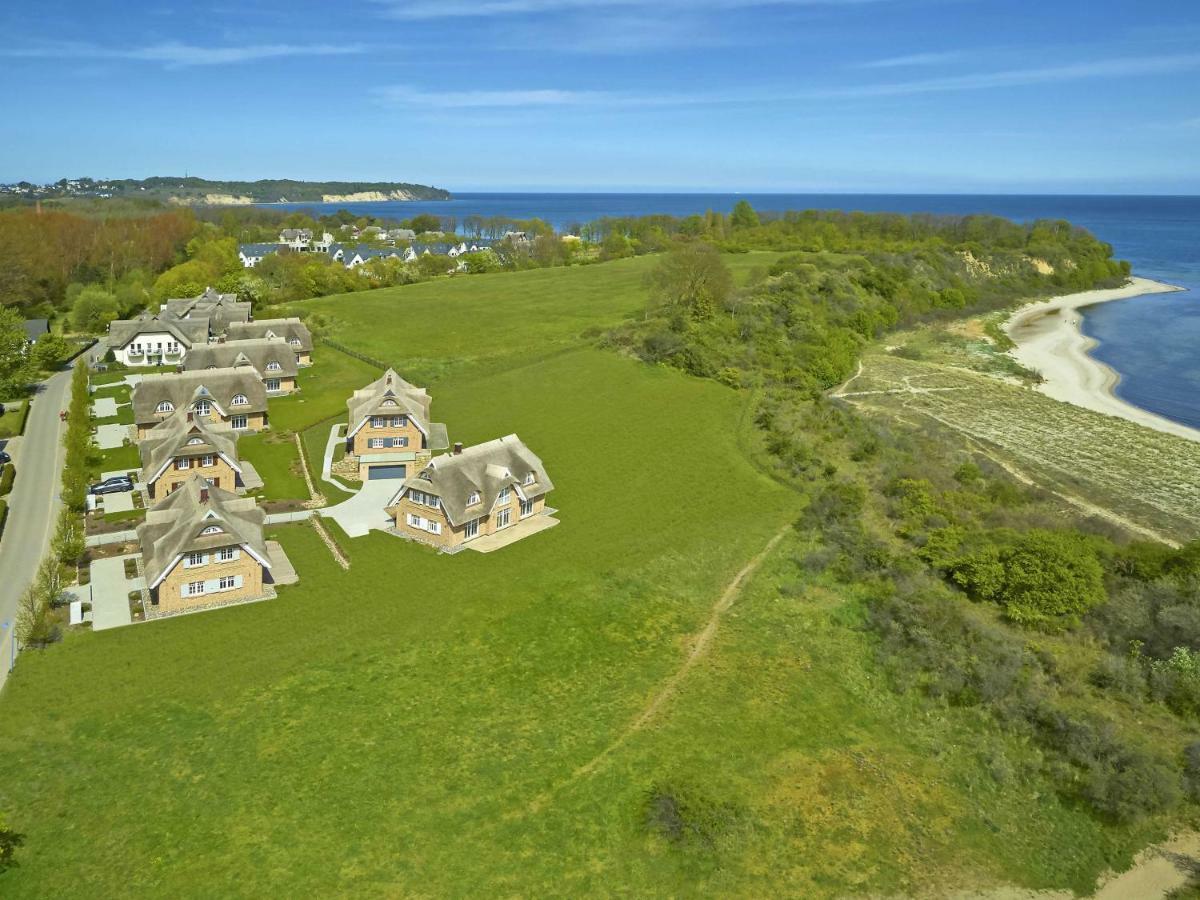 Strandhaus Oie F661 mit Meerblick, Kamin, Sauna Lobbe Exterior foto